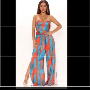 Beautiful, never worn romper! Tags still in place.